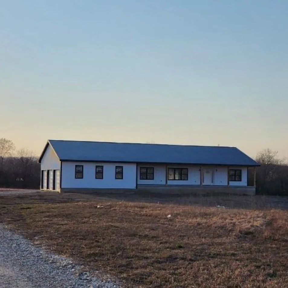 Building finished with matching metal roofing and metal siding